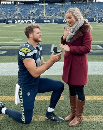 Double Joy After the Win Over the Titans – QB Sam Darnold Surprises Girlfriend Katie Hoofnagle With an Emotional Proposal at Nissan Stadium, A Moment That Brought the Entire NFL to Tears