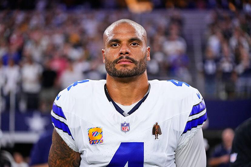 After a crushing 17–27 loss to the Cardinals, Dak Prescott bowed his head and took full responsibility – but the moment a furious fan rushed in and screamed in his face, calling his performance a ‘Joke’
