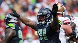 Seahawks Star Receives Severe Internal Discipline After Disrespectful Act Toward Christian McCaffrey — A Viral Image That Sent the NFL Into an Uproar