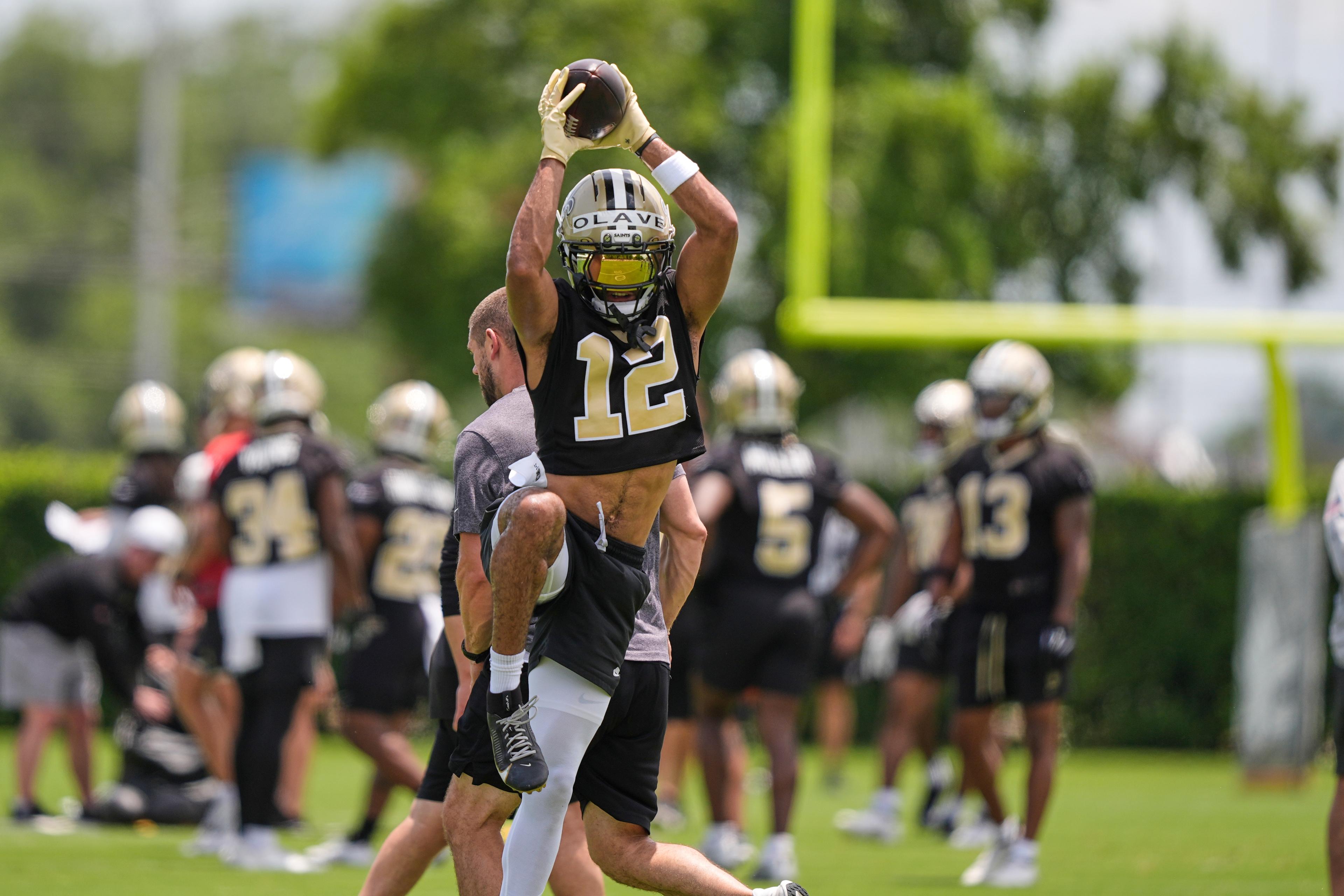 Saints receiver Chris Olave brushes off concussion concerns and laughs off  trade talk